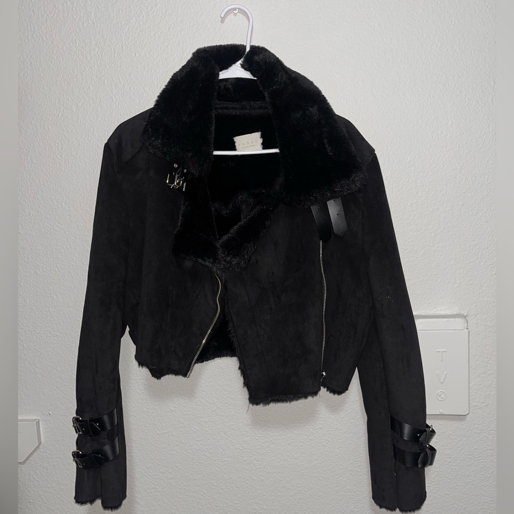 Fur jacket with buckles